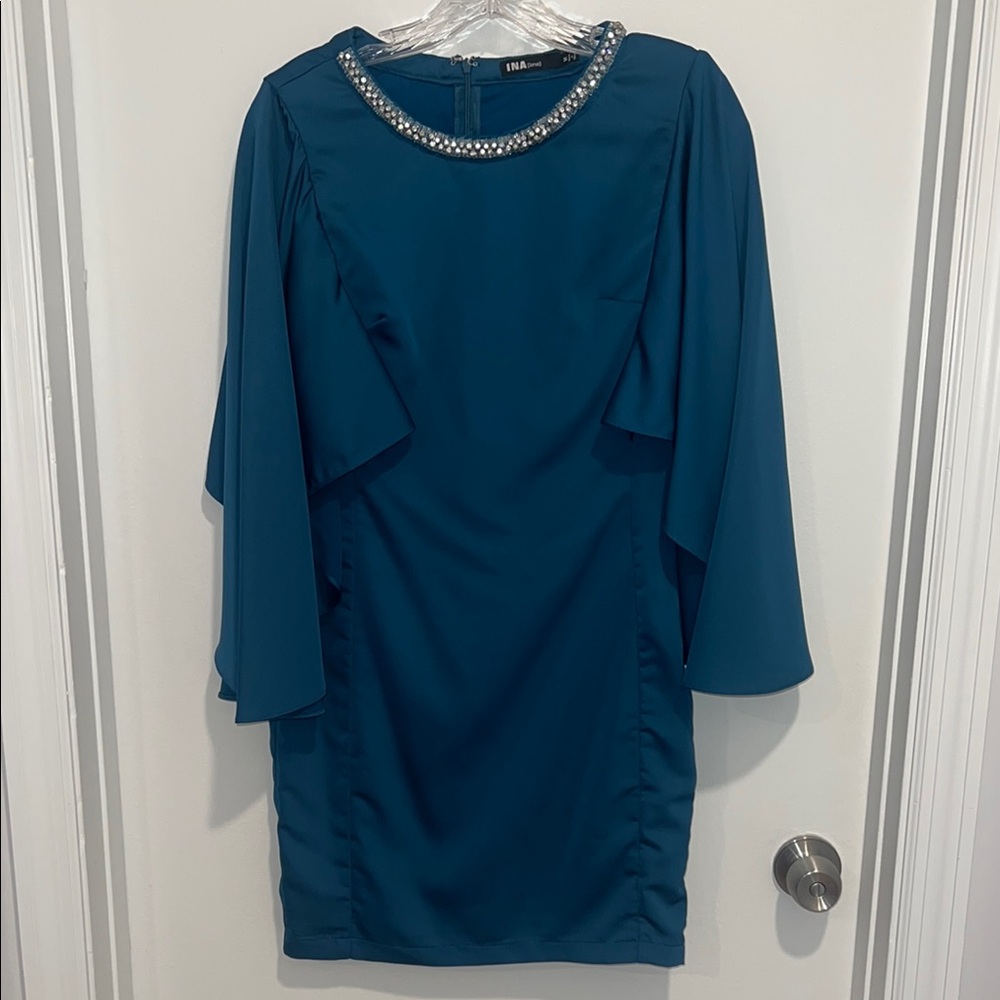 Elegant Blue Dress with Embellished Neckline size medium INA brand